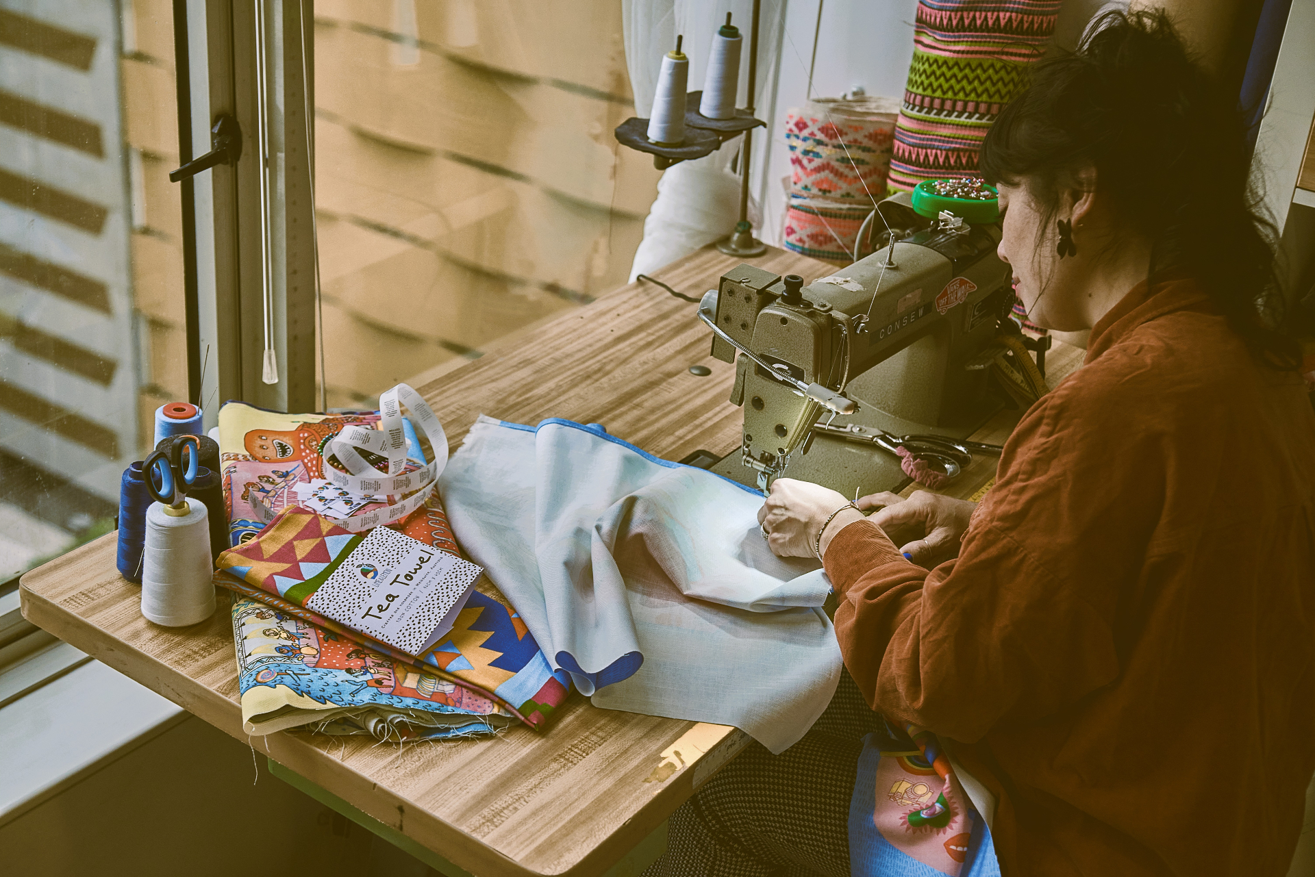 Sewing a printed tea towel with illustrated characters